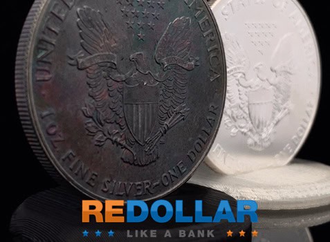 A beautifully tones American Silver Eagle next to an uncirculated coin.