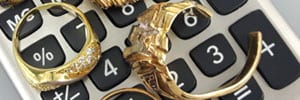 scrap gold rings on a calculator for calculating value