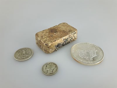 stock image: scrap gold and United States silver coins
