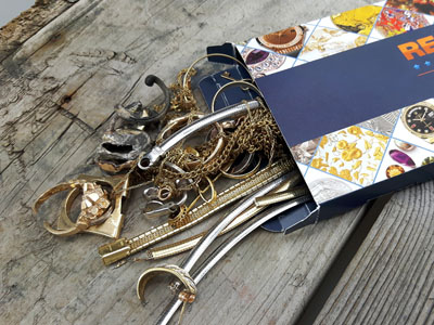 stock image: pack and ship scrap gold and jewelry