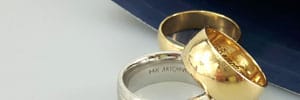 2 yellow gold rings and one 14k white gold ring