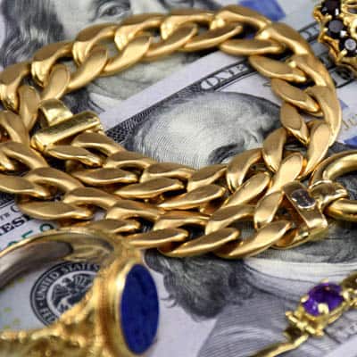 unwanted 14K gold chain on US dollars, seal ring and bracelet