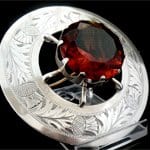 red garnet silver brooch