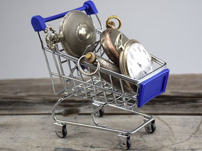 stock image: silver pocket watches, shopping cart, antique watch