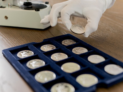 stock images: cotton gloves, hands, silver coins, Silver Eagles