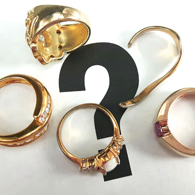 14k gold and 18k gold rings on question mark