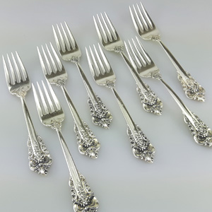 family silver forks branded "Wallace"