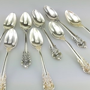 8 Wallace sterling silver soup spoons
